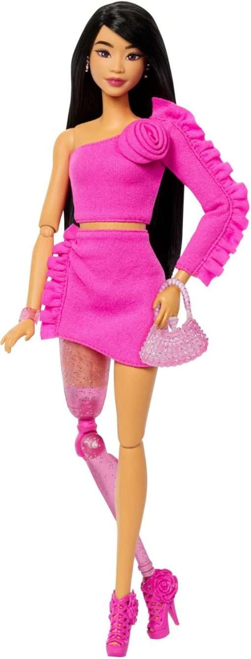 Barbie Deluxe Style Doll #2 in Barbiecore Outfit, Black Hair and Glittery Prosthetic Leg, Pink Top and Skirt Set with Rosette Detail and Accessories - 1