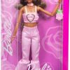 Barbie Deluxe Style Doll #12 in Pink Denim Crop Top with Matching Rose Print Flare Jeans, Wavy Brown Hair, Accessories Like Rose Handbag and Jewelry - 6