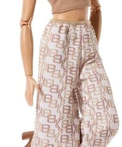 Barbie Basics Model Collector Fashion Doll 06 with Blonde Hair, Shimmery Golden Skirt & Halter, Universal-fit Fashions, Posable Body - 1
