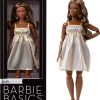 Barbie Basics Model Collector Fashion Doll 09 with Brunette Hair in Golden Dress & Strappy Heels, Universal-fit Fashions & Posable Body - 1