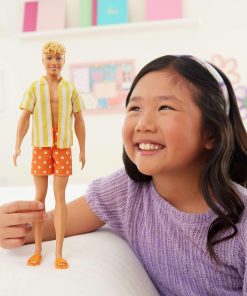 Alternative view of Barbie Fashionistas Style Ken Doll #252 with Blond Hair, Wearing Orange and Yellow Polka-Dot Board Shorts with Yellow and White Striped Shirt, Orange Shoes